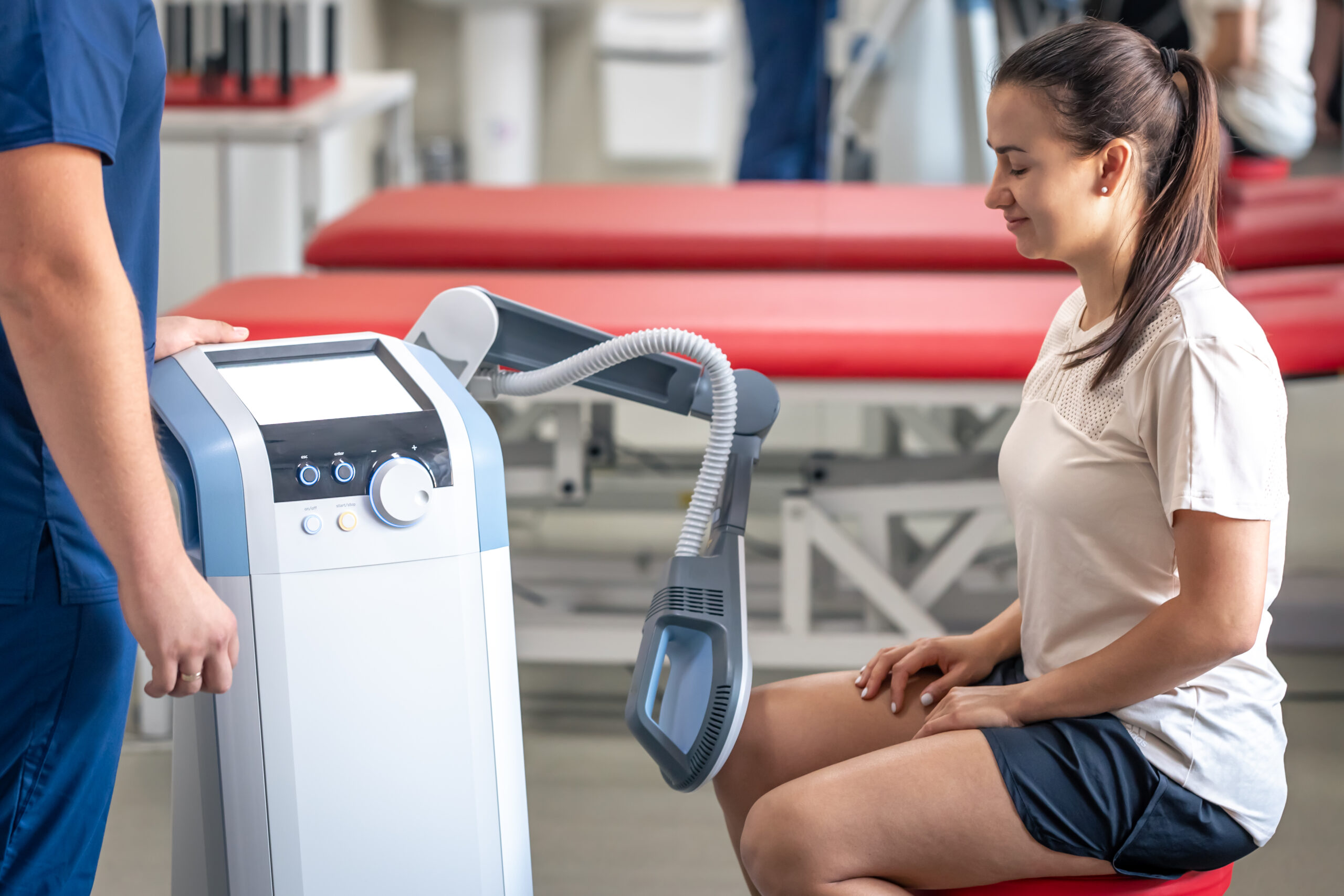 doctor using machine to treat the knee joints of a 2025 03 16 13 23 09 utc scaled